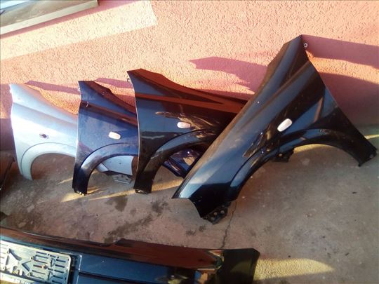 Krila za Opel Astra G crna plava teget siva boja