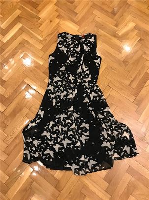Crna leprsava haljinica sa belim leptiricima