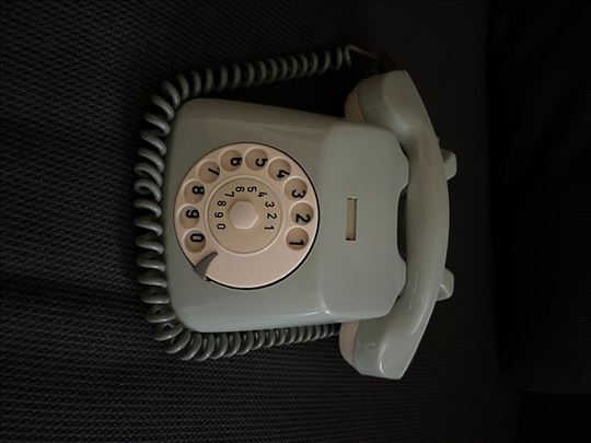 Stari fiksni telefon Ei-bakelitni