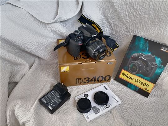 Nikon D3400 sa objektivom 18-55  2990 okidanja