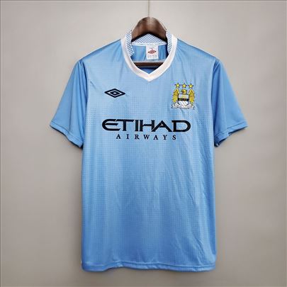 Manchester City 2011/2012 domaći dres