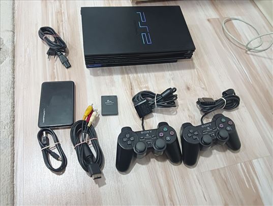 SONY Playstation 2 FAT / 143 IGRICA + 37 Filmova