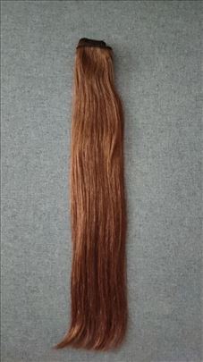 Prirodna kosa na tresi 60cm riđa