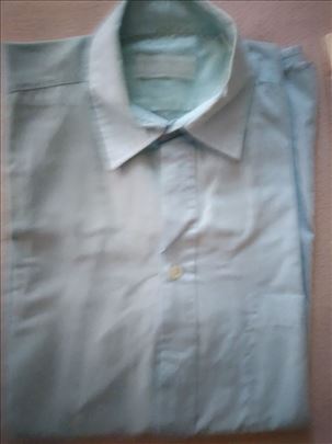 Kosulja  vel. 41 svetlo plava,poliester/pamuk,ocuv