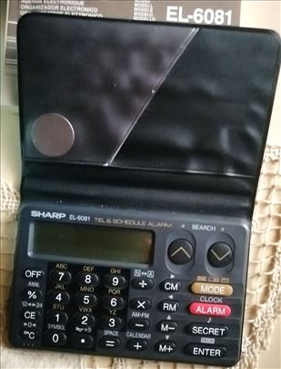 Džepni "multipraktik" - digitron - brenda "Sharp" 