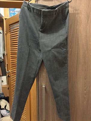Pantalone teget sa belim prugama, veličina 40