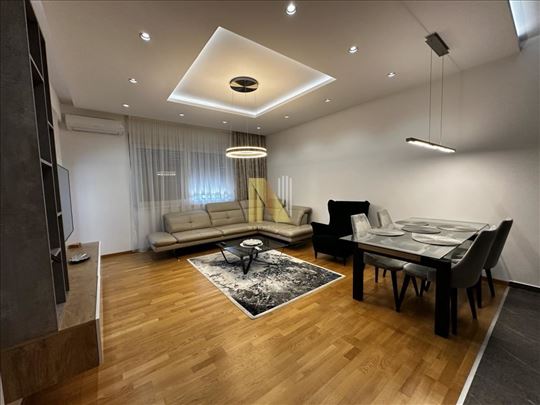 Izdaje se - luksuzno namešten stan sa garažnim mes