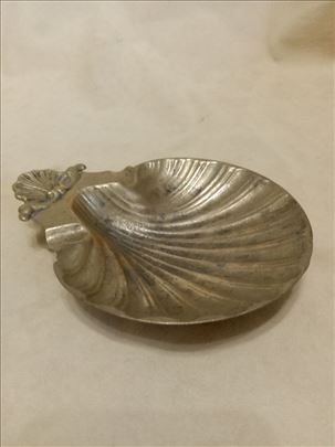 Pepeljara školjka, mesing