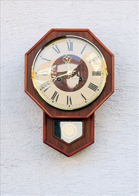 Zidni sat sa klatnom OKTAGON.