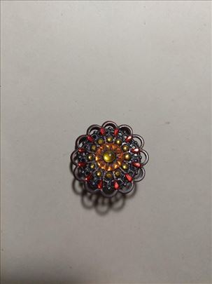 Okrugli bakarni broš