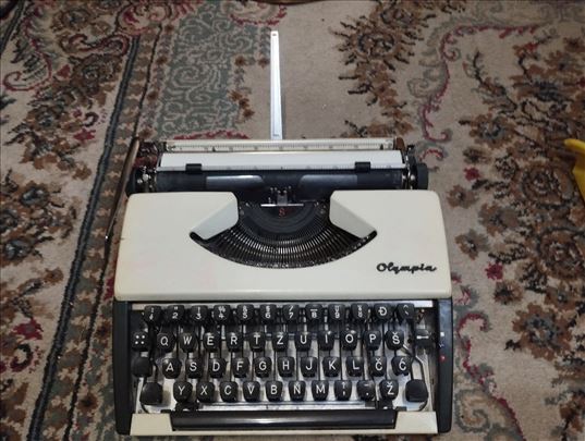 OLYMPIA SF stara pisaca masina ispravna odlicna sa