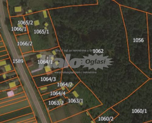 Plac pored Drine 25 ari sa uknj objektima i šumom