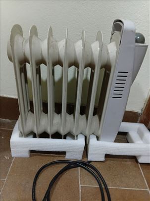 Uljni radiator 7 rebara ispravan,