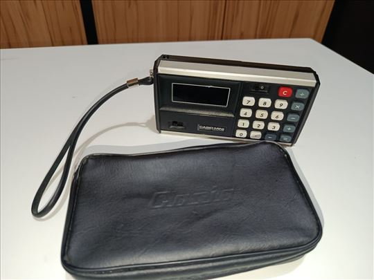 Casio Mini CM-602 Handheld Electronic Calculator