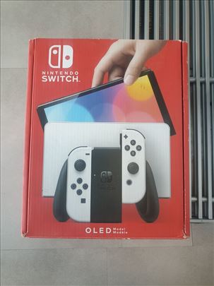 Nintendo switch oled 7 inča 64gb,dosta opreme