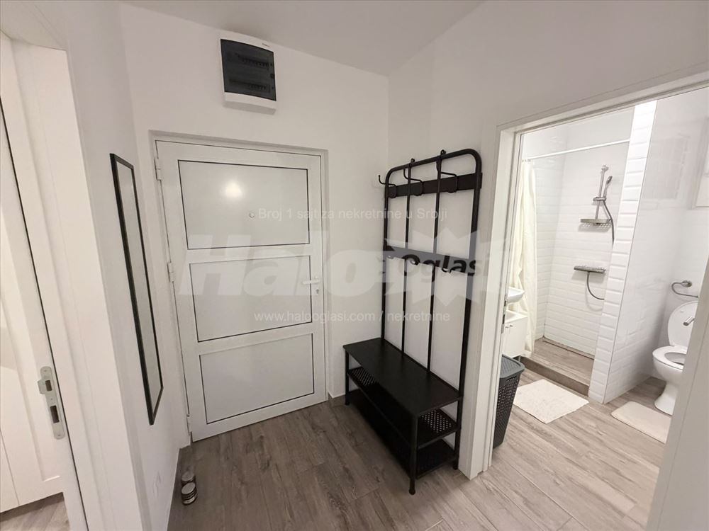new apartment in a smaller building, with a parking space — photo